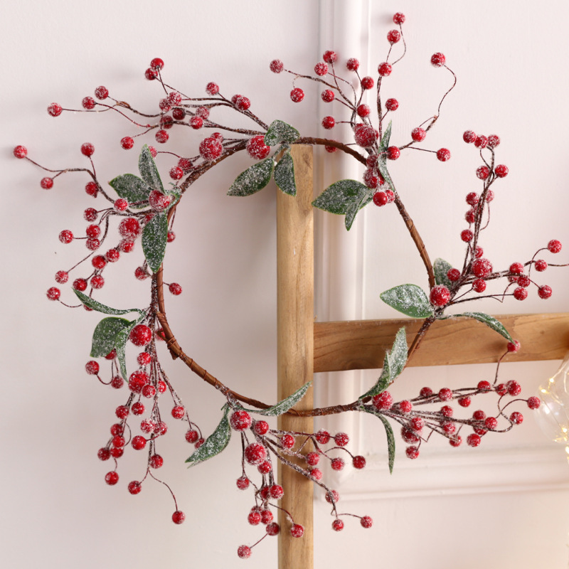 Christmas wreath with berries and fruits