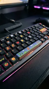 Close-Up Photo of a Mechanical Keyboard with Custom Pixel Art Keycaps