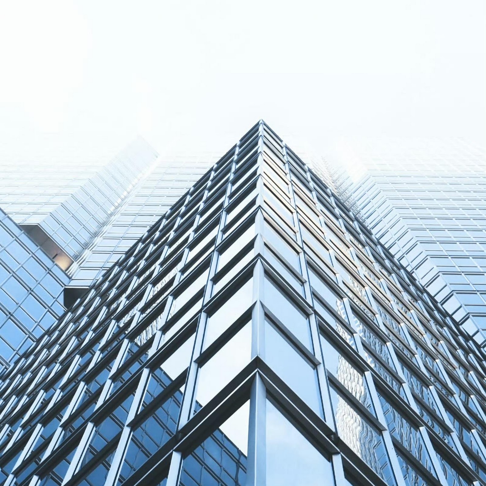 Download Modern Glass Skyscraper Corner 2K iPhone