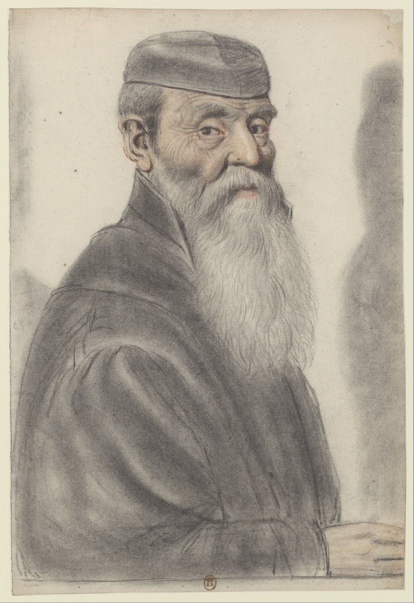 Homme âgé à longue barbe portant un bonnet noir de trois quarts à droite