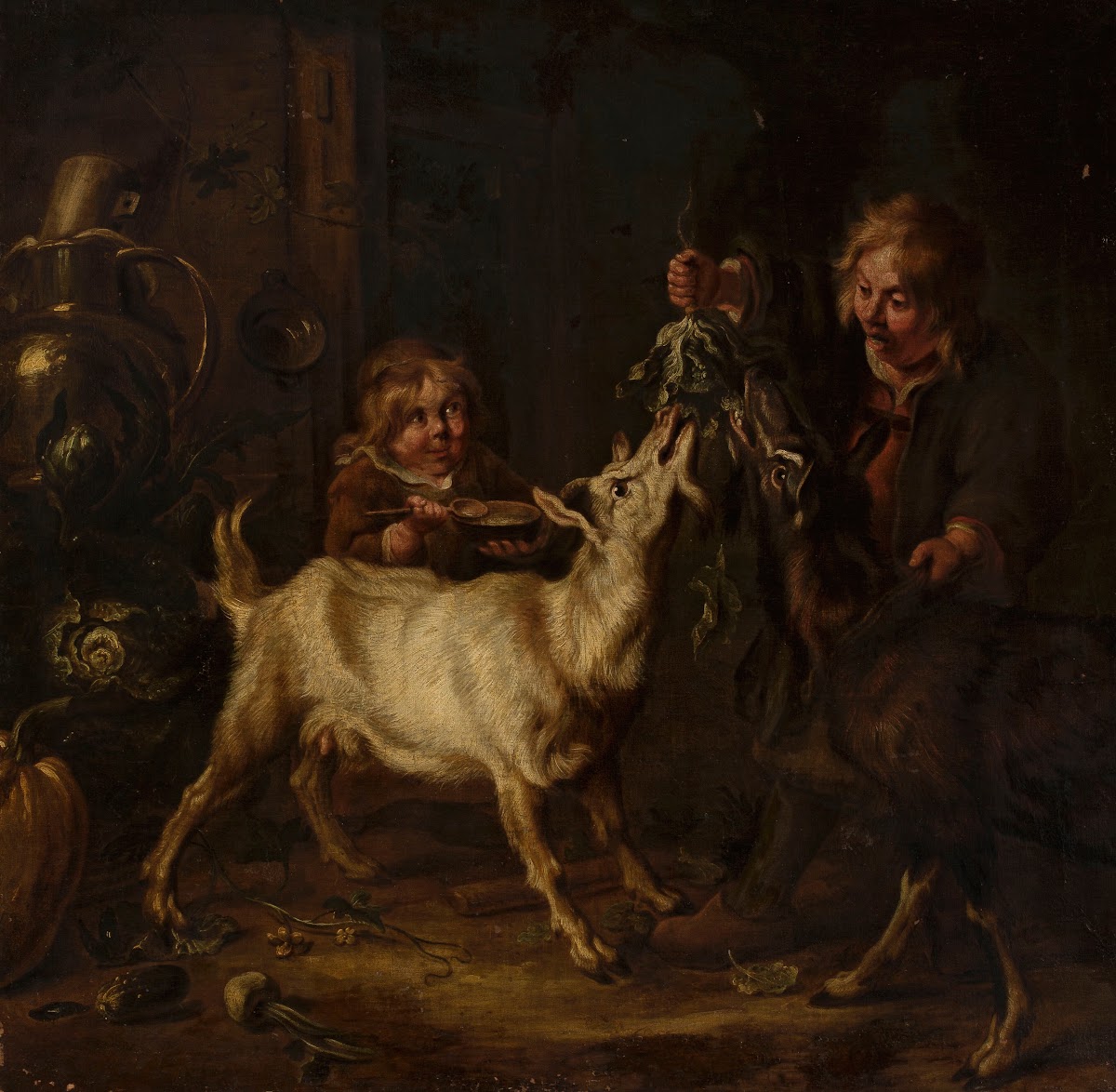 Children feeding goats