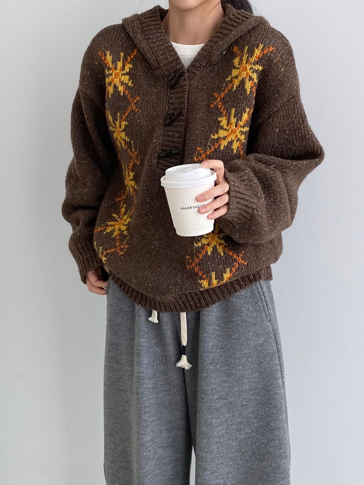 Hooded sweater with snowflake pattern, knit