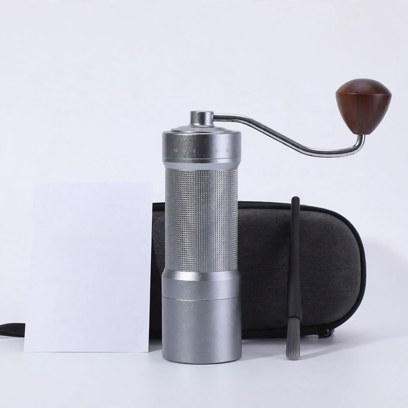 Hand coffee grinder with CNC grinding mechanism and brush