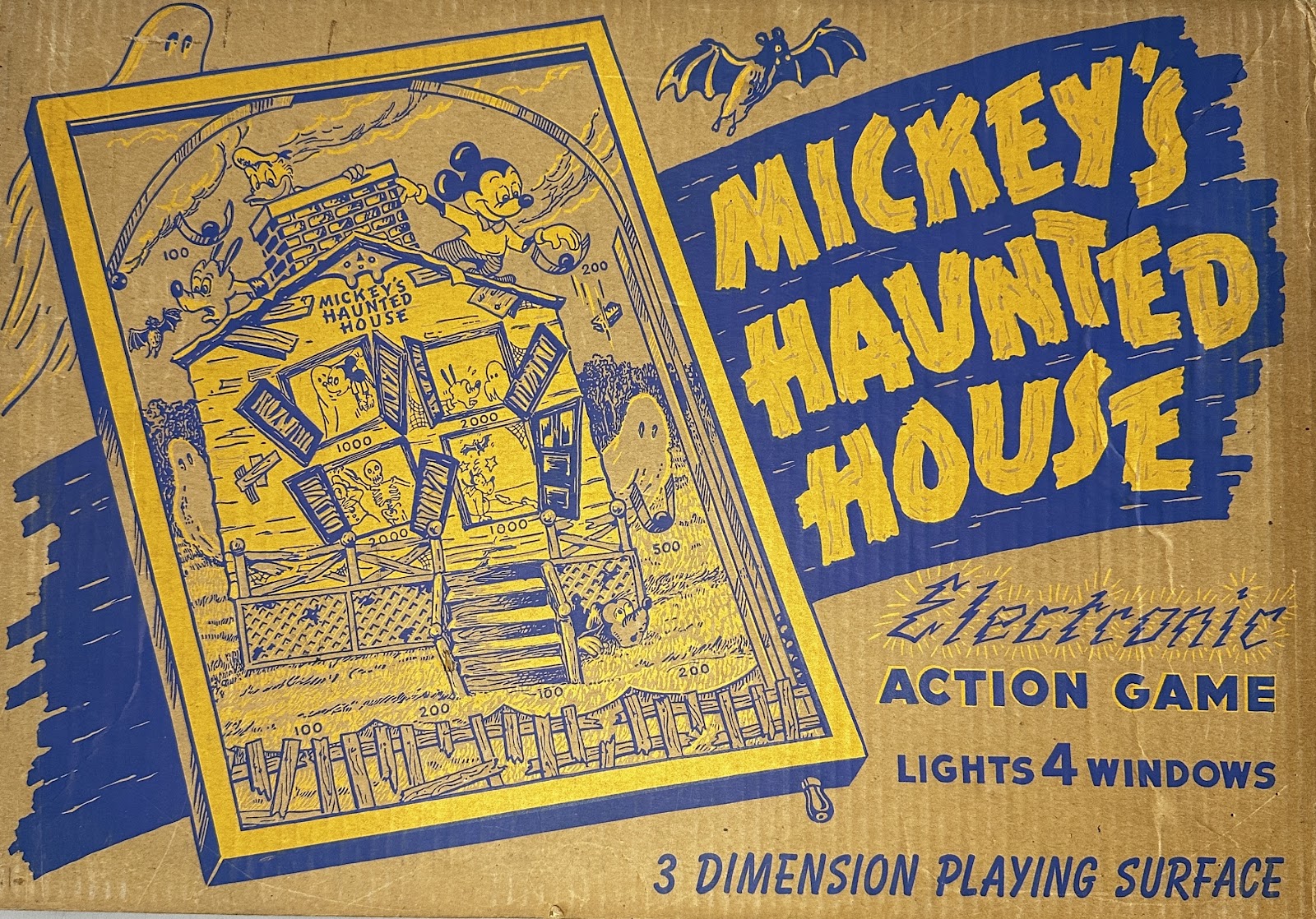 Mickey's Haunted House Electronic Action Game, a mid-century Walt Disney Productions skill game with a kraft-cardboard haunted-house playfield and score holes
