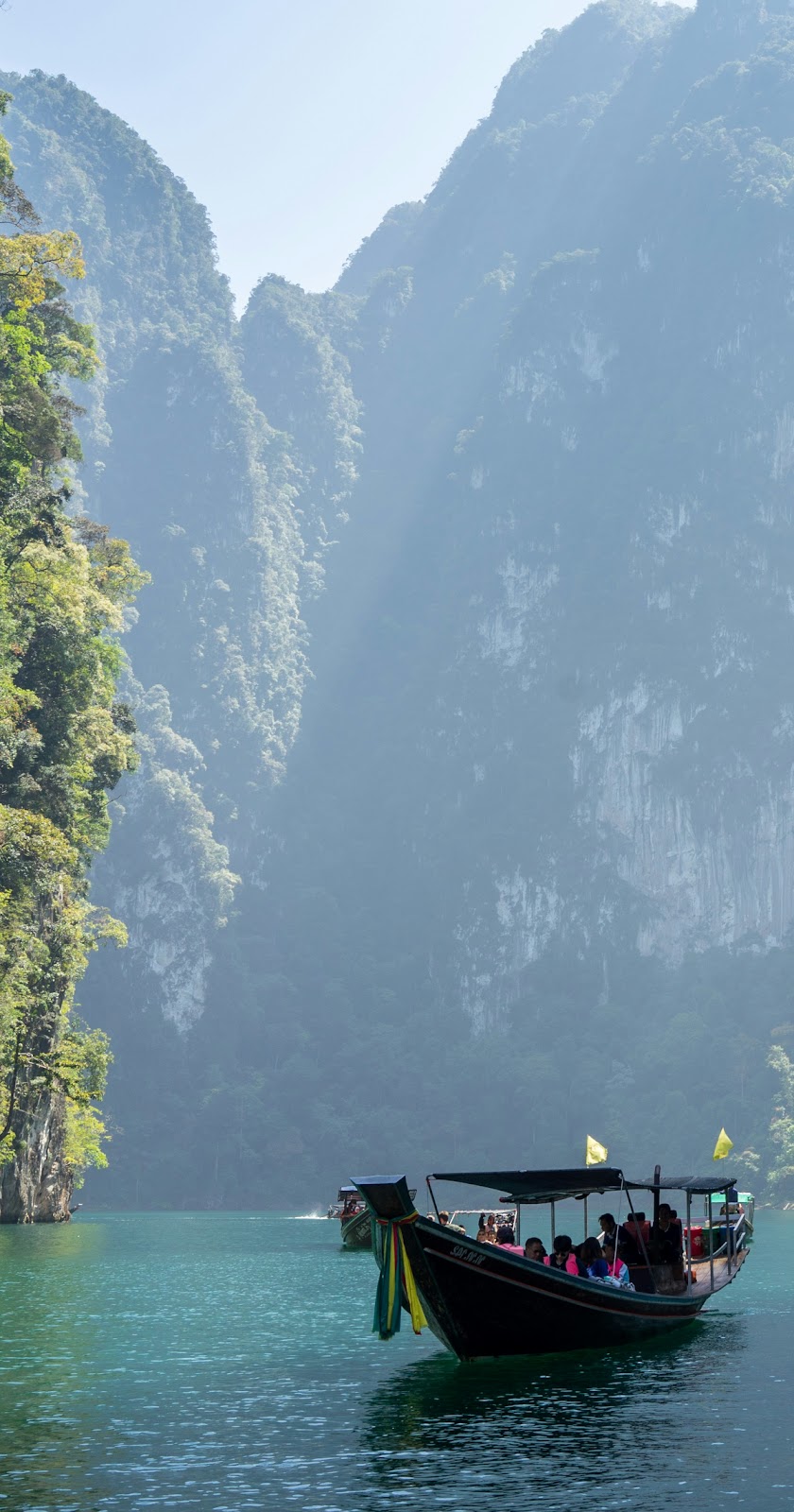boat on a narrow canyon riverway