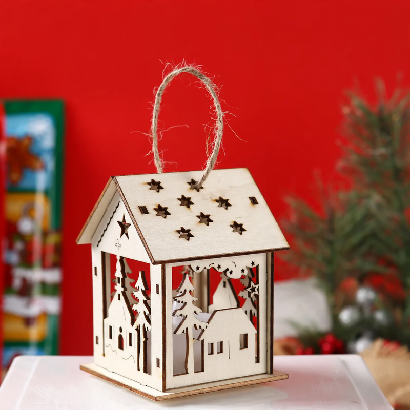 Illuminated wooden house for Christmas decoration