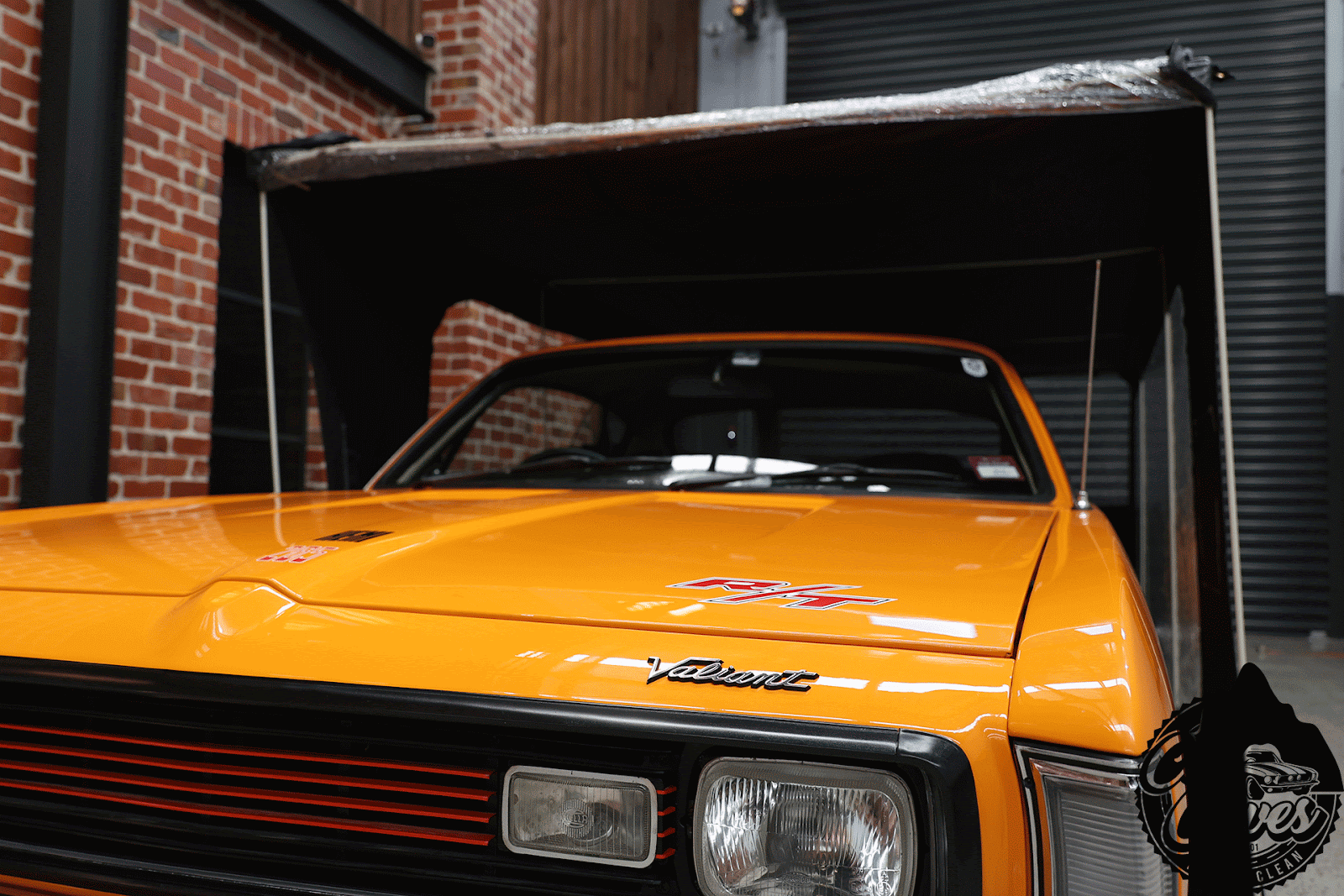 Car Cave protecting a classic car in a garage