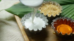 dùng đường thốt nốt làm ít caramen để chấm với bánh bò. rang ít vừng (mè) và chuẩn bị thêm ít nước cốt dừa rưới lên bánh để tăng độ hấp dẫn.Mọi người có thể chấm với đường và nước cốt hoặc có thể rới trực tiếp lên bánhChúc mọi người có một công thức ngon nhé