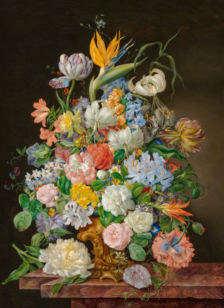 A bird of paradise roses tulips and other flowers in a gilt bronze vase on a sto
