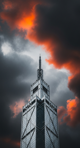 Spire Above Red Storm Clouds