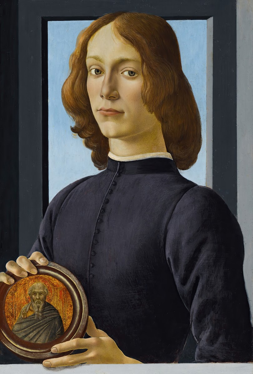 Portrait Of A Young Man Holding A Roundel