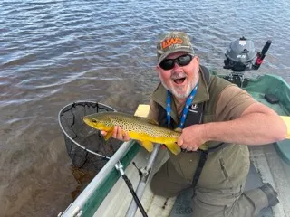 Craig Graham with a Brown Trout caught on a sunk mayfly pattern at St Johns Loch Caithness
