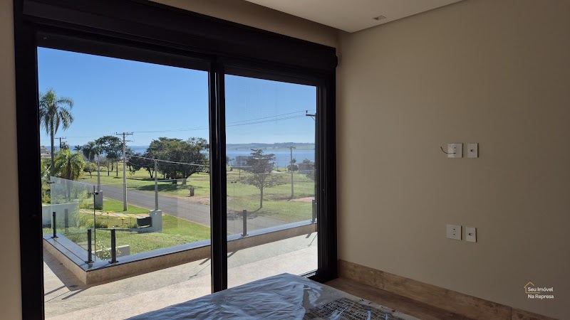 Foto 10 de Casa com 5 suítes e vista incrível para a represa Jurumirim à venda no Riviera de Santa Cristina XIII