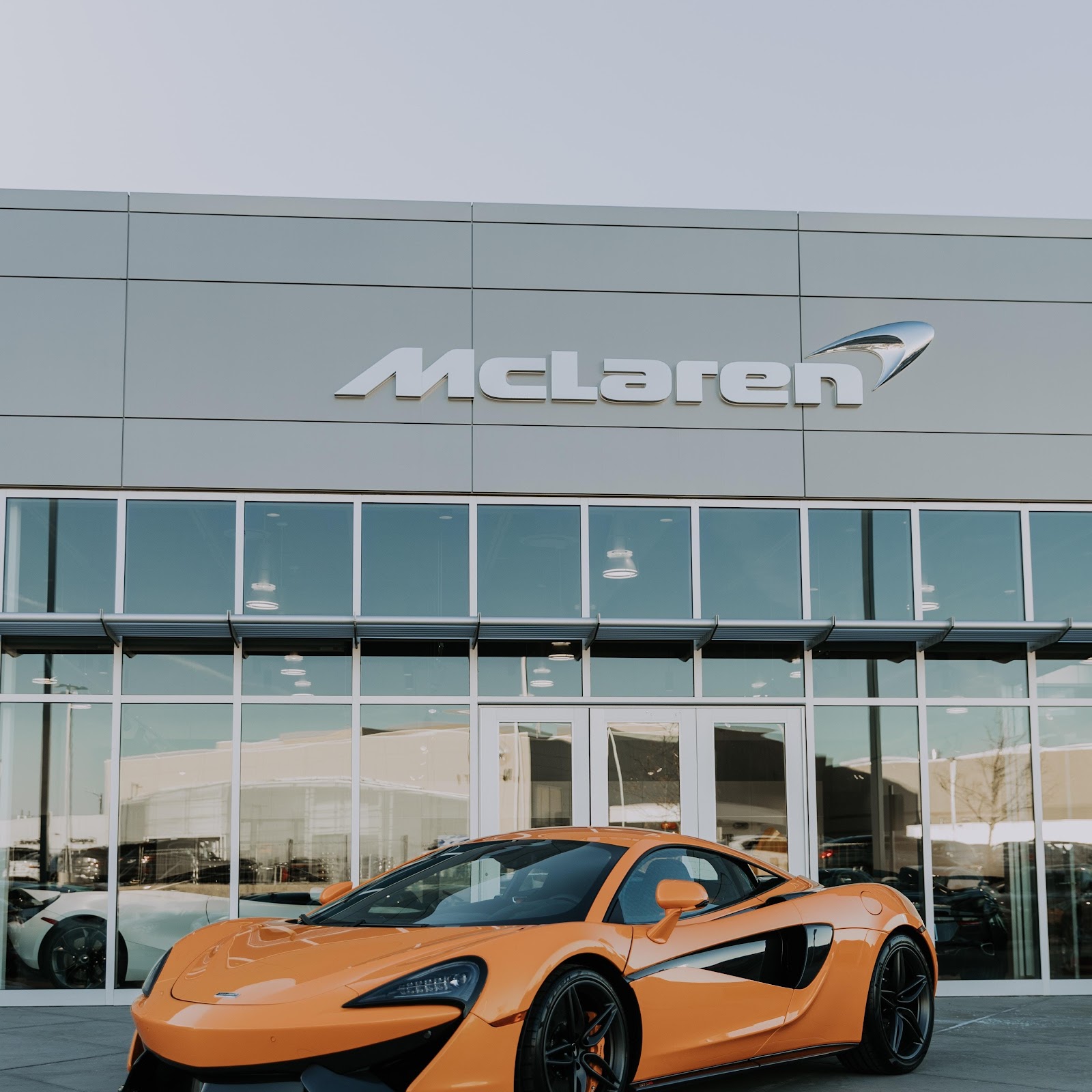 Download Orange McLaren Sports Car 5K iPhone