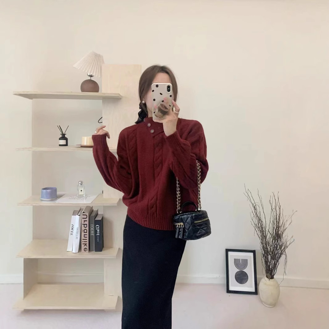 Short cable knit sweater with asymmetrical neckline