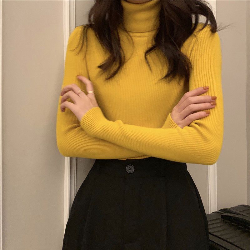 Women's knitted sweater with turtleneck, form-fitting