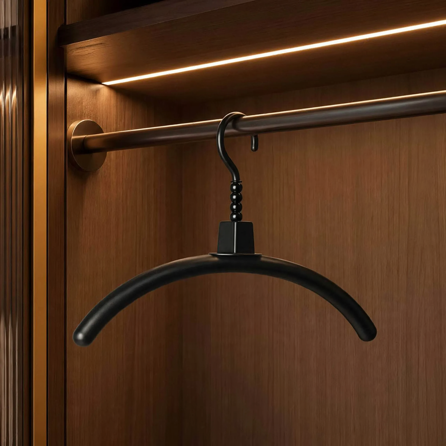 Plastic hanger with non-slip surface