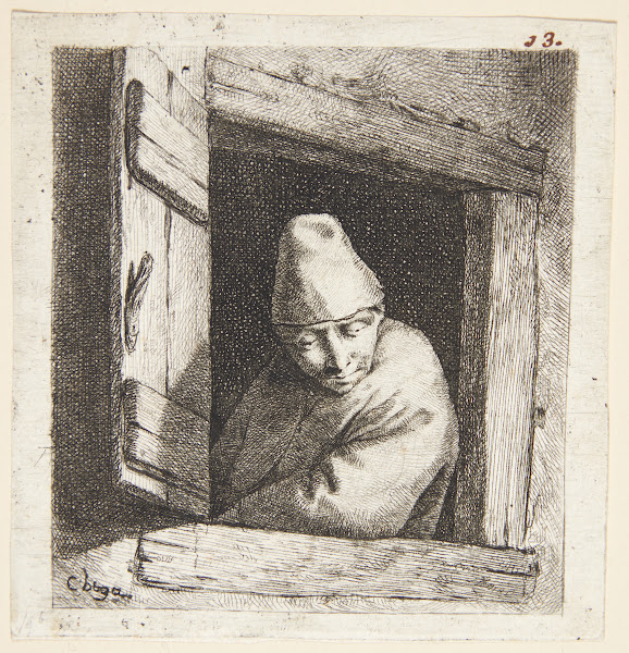 Bonde der ser ud af et vindue