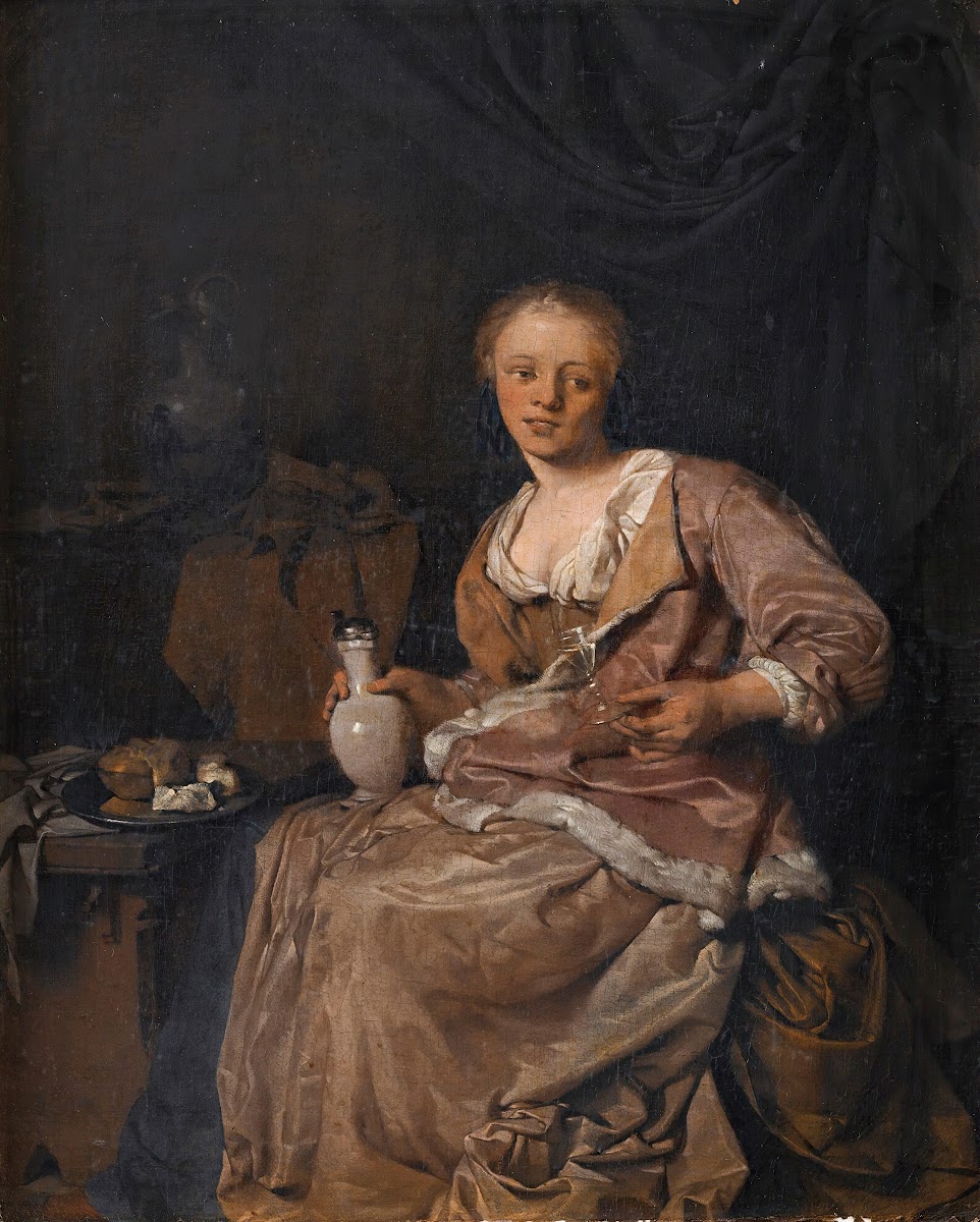 Young girl having a glass of wine in an interior