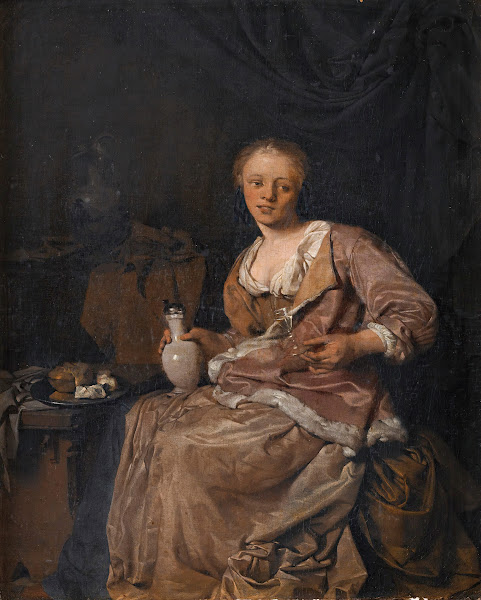 Young girl having a glass of wine in an interior