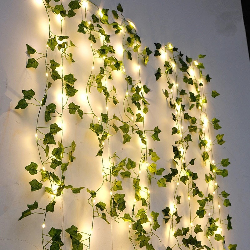 LED string lights with artificial plant vines