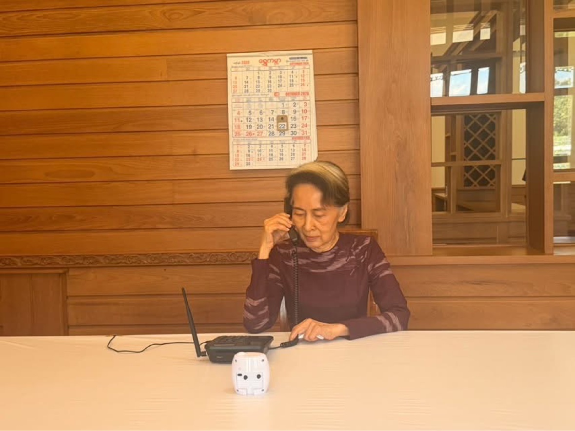 Aung San Suu Kyi speaking on the telephone