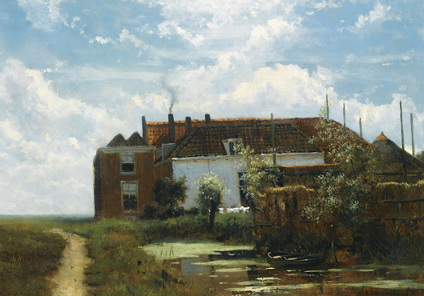 A FarmAlong A Canal In A Polder Landscape
