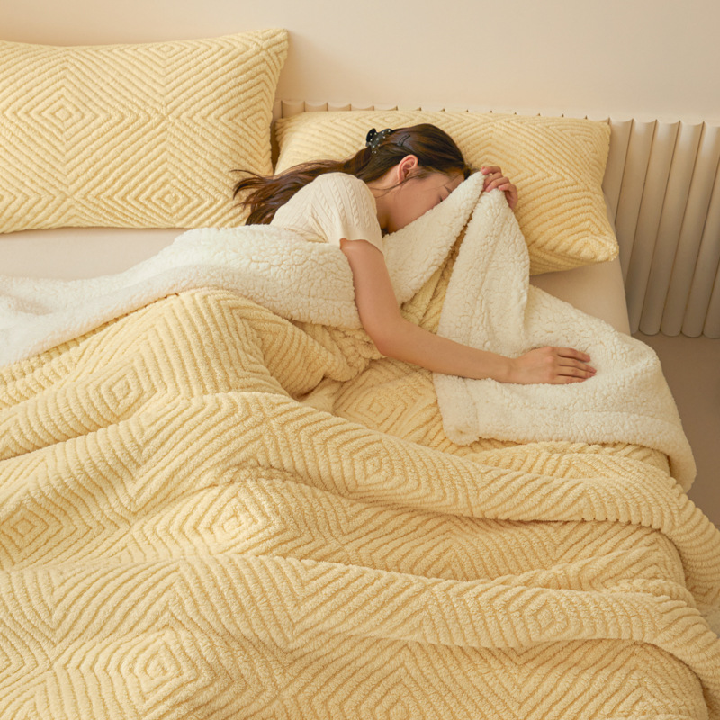 Double-sided lamb fleece blanket with geometric pattern