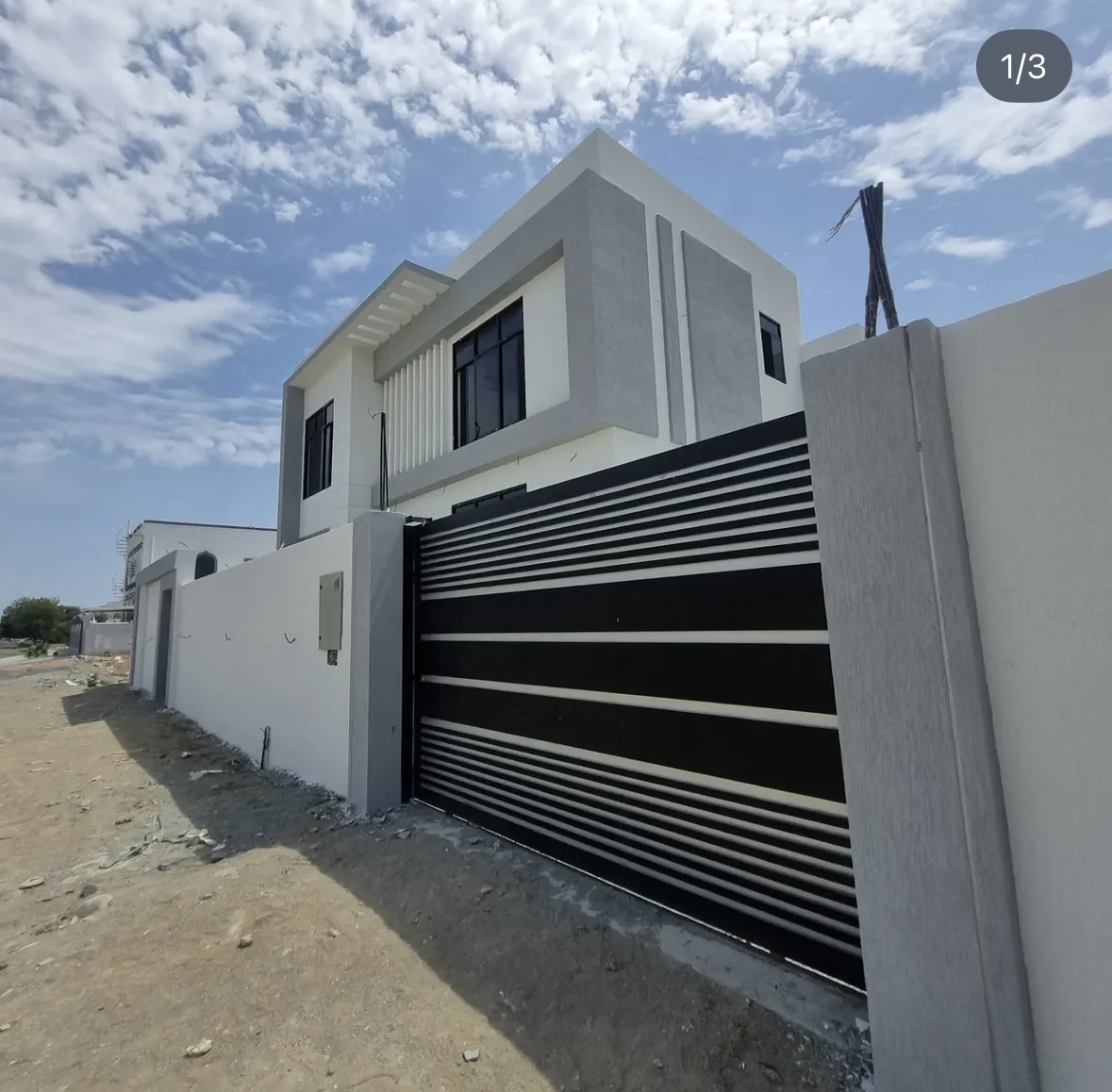 Double leaf metal gate Fujairah — Al Taher Group