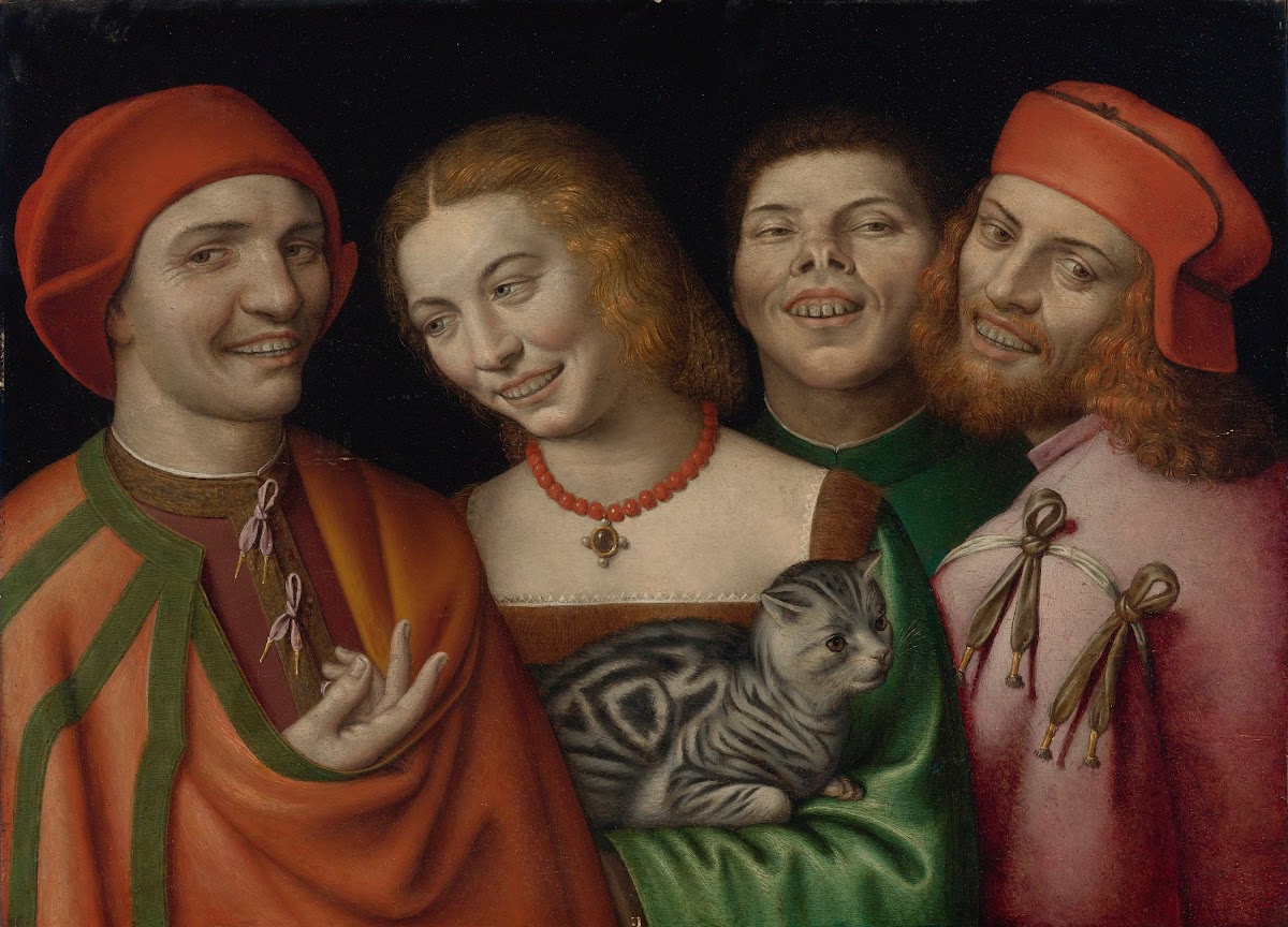 Three Men Witha Woman Holding A Cat