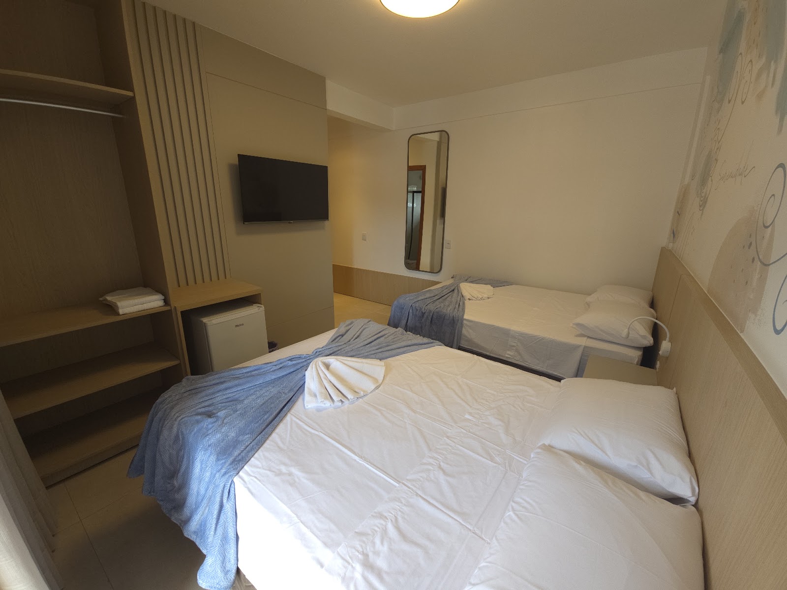 Quarto Quádruplo com Sacada no PENHA QUALITY HOTEL