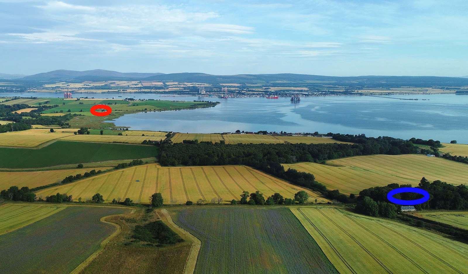 Udale_story_looking_across_the_Udale_fields_from_Udale_House_blue_ellipse_to_Udale_Bay_and_Kirkmichael_red_ellipse_DJI_0863.jpg