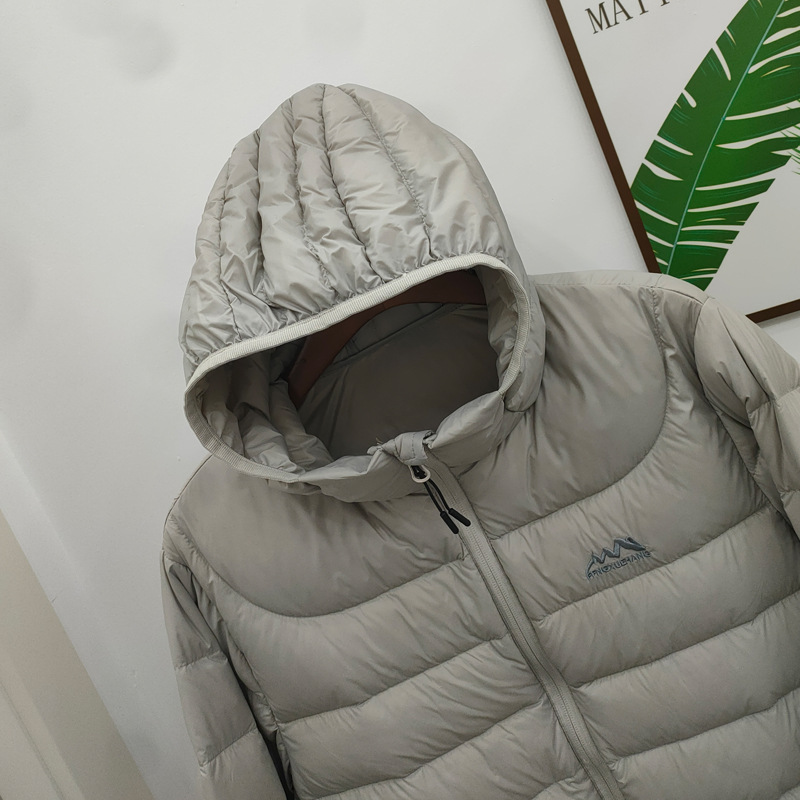 Light ladies down jacket with hood, quilted