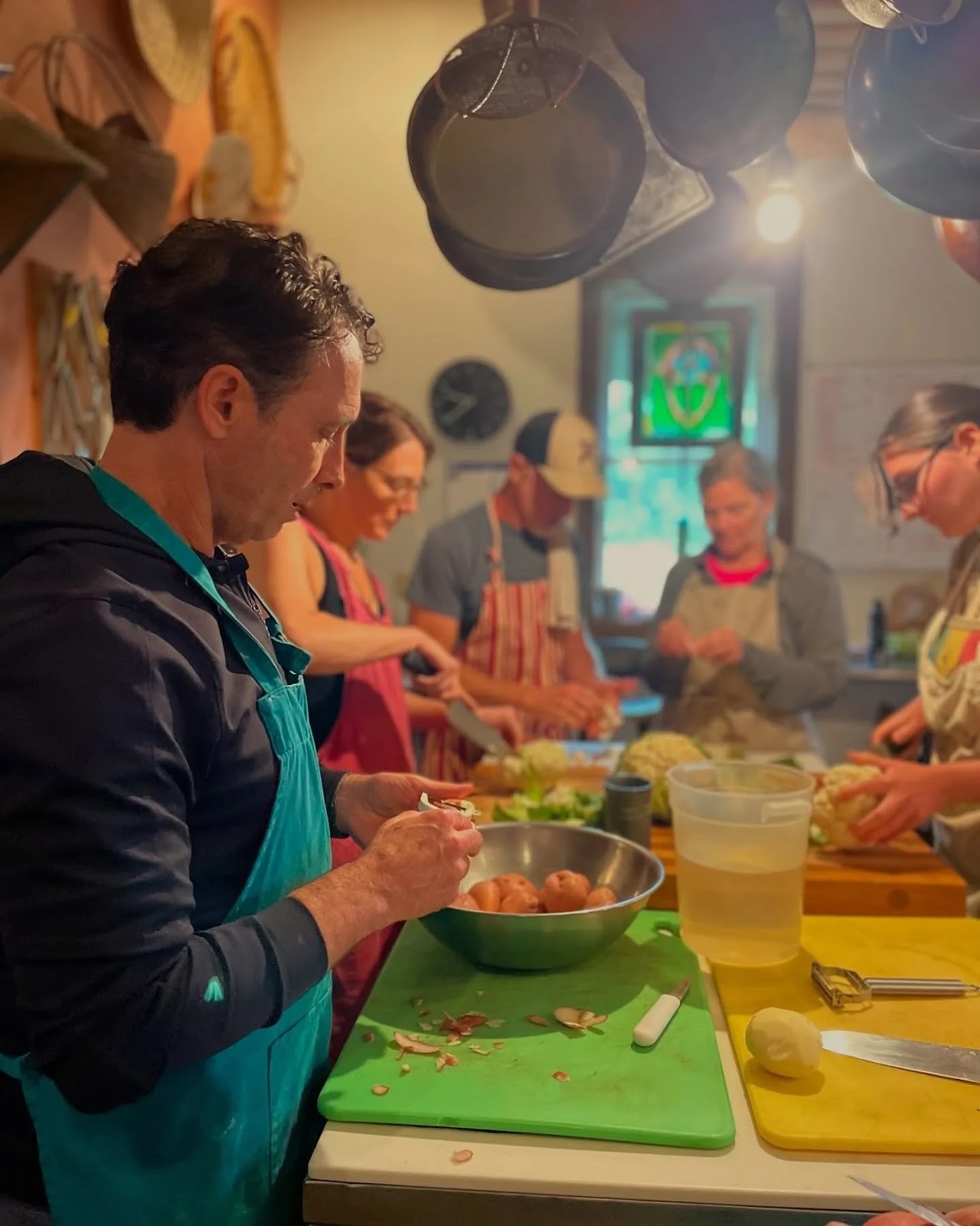 Participants cooking in the Ayurvedic kitchen