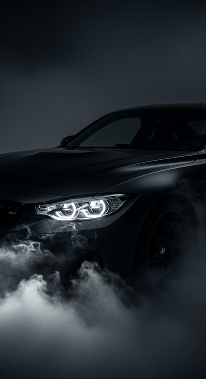 Black Sportscar Headlights in Smoke