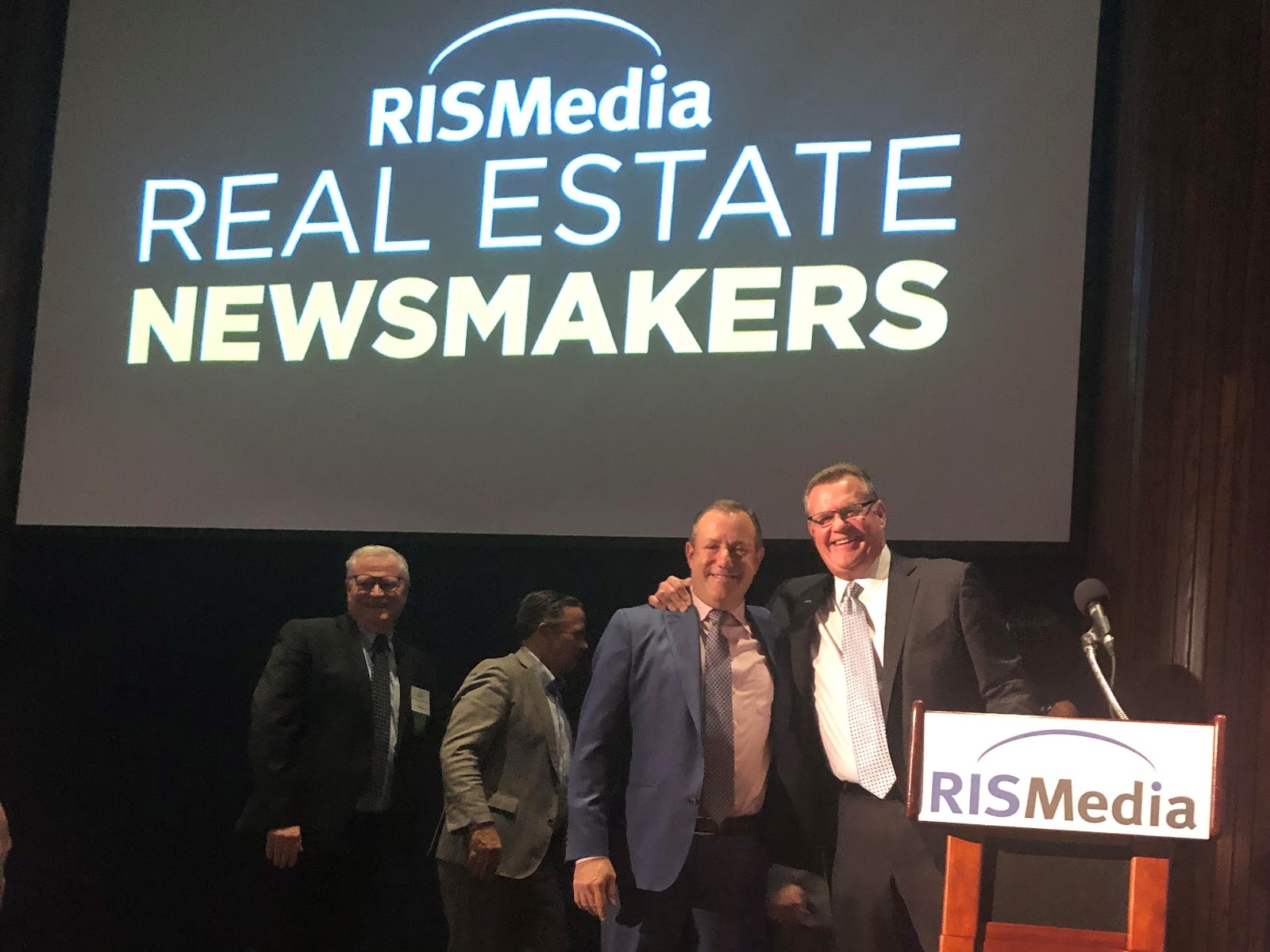 Ken Baris receiving the RISMedia Newsmaker Award, 2023