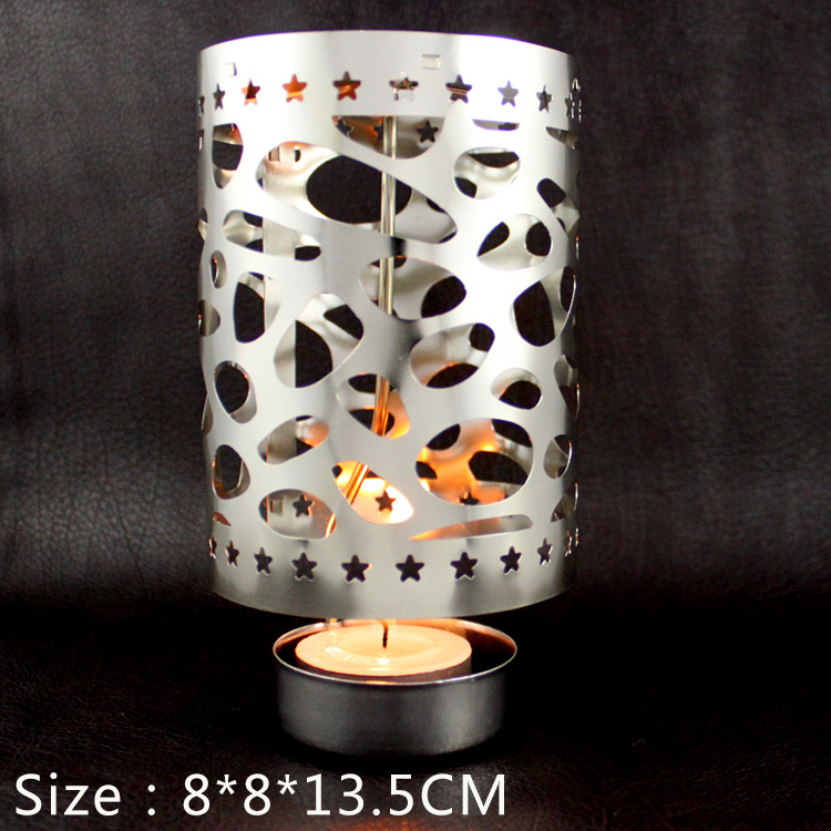 Rotating brass tealight holder, pierced design