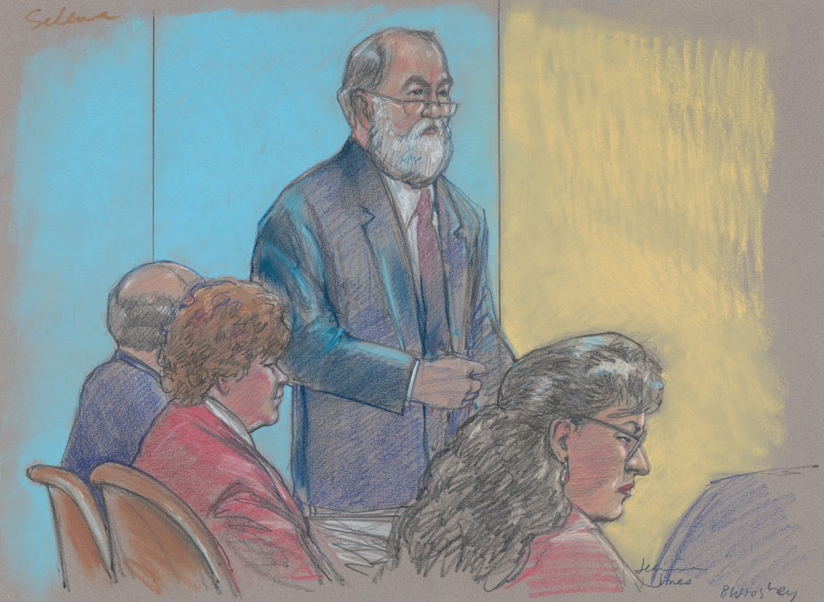 Lawyer speaking in front of others during the trial of Genene Jones for the murd
