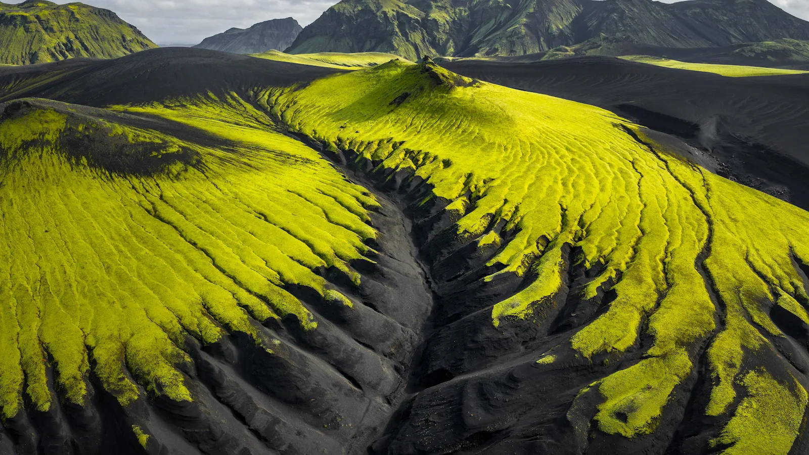 Neon Moss On Black Lava Fields - Aerial Nature Photography 4K Wallpaper (3840x2160)