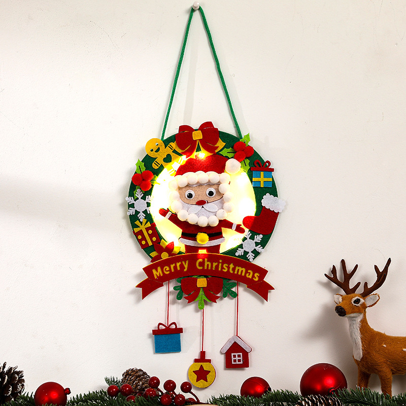 Christmas wreath made of fabric with LED lighting