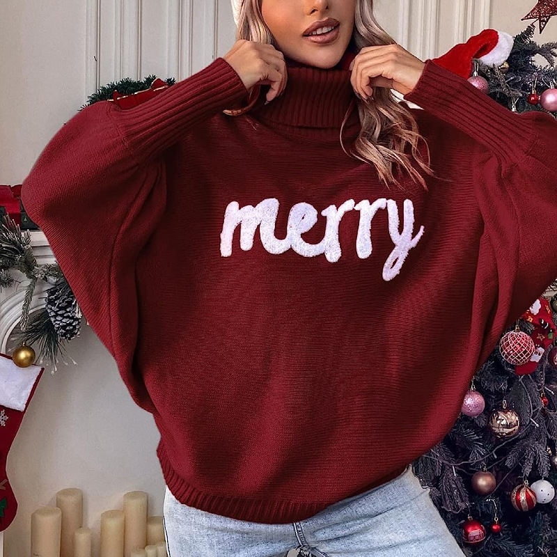 Women's knitted sweater with stand-up collar and embroidery