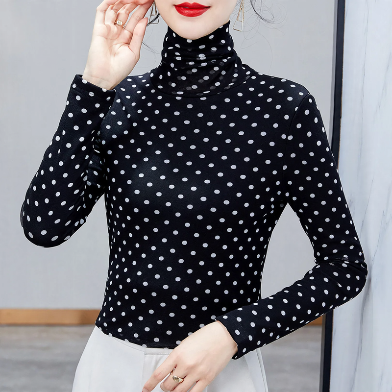 Women’s top with stand-up collar and polka dot pattern