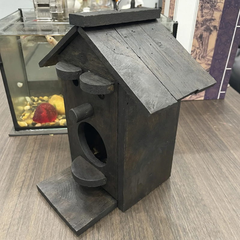 Teak wood birdhouse