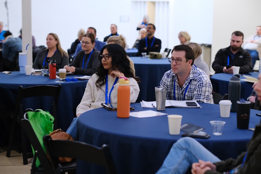 Attendees listening to a session at Colorado RE•CON