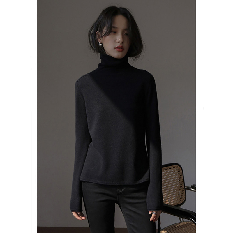 Women's wool sweater, stand-up collar, loose fit with slit