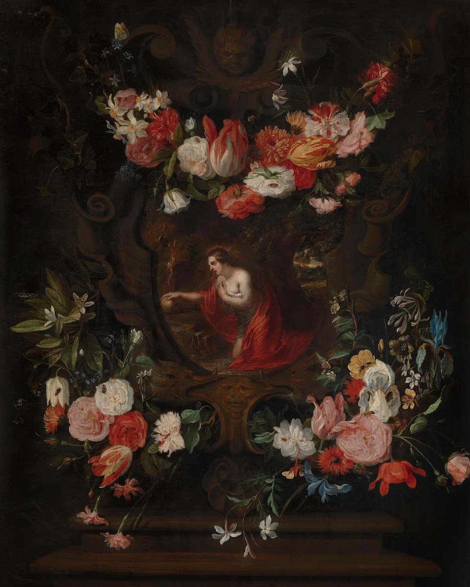 Flower wreath frames the virgin Mary