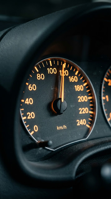 Macro Close-Up of a Car Speedometer and Dashboard at Night - Free mobile Wallpaper