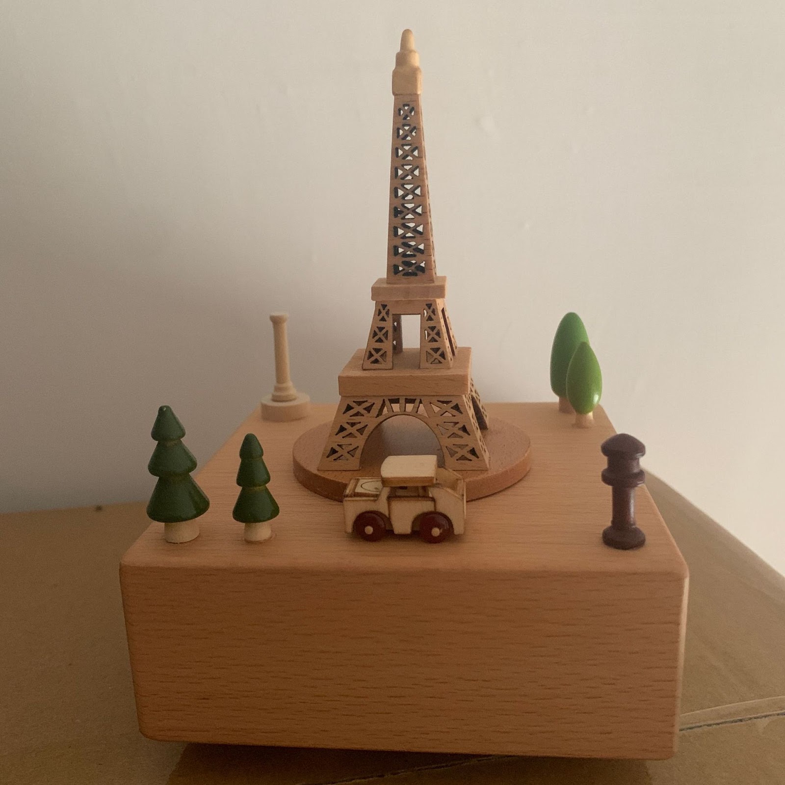 Decorative wooden music box with mechanical movement