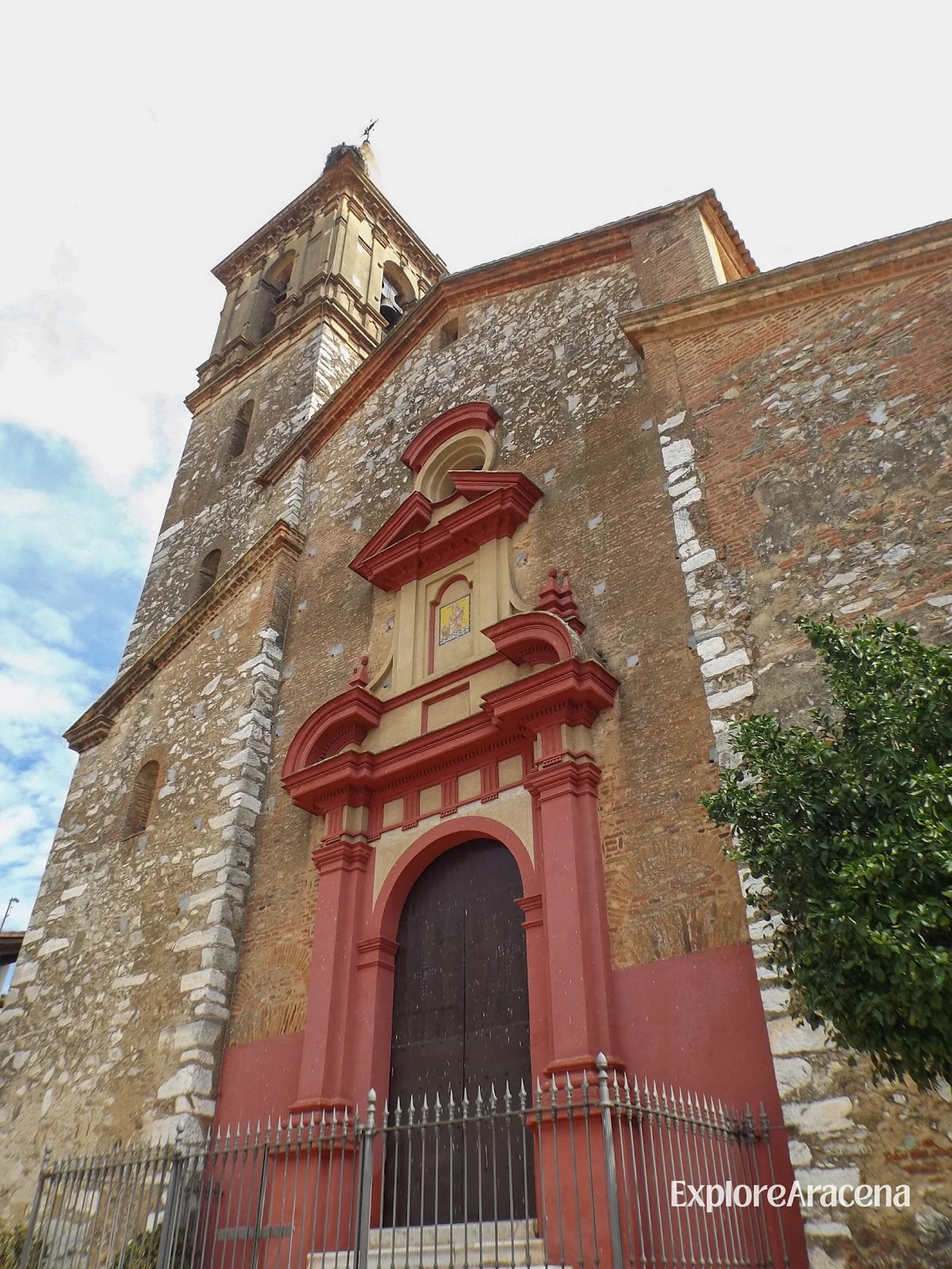 Iglesia de San Marcos rising above the whitewashed houses in the centre of Alájar.