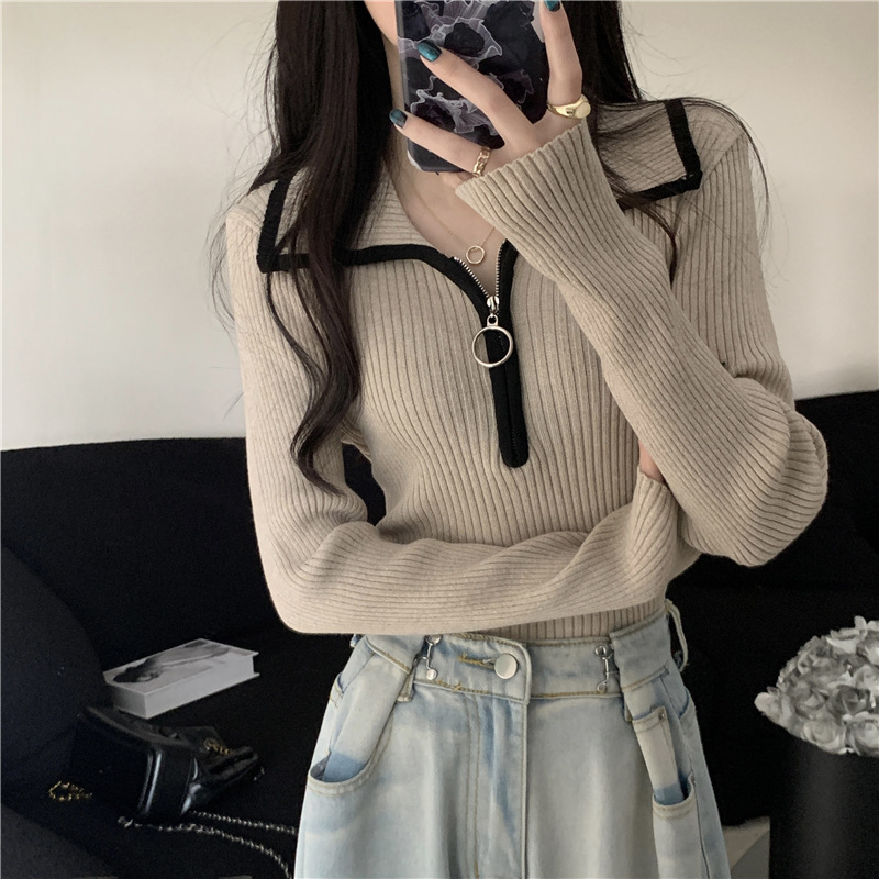 Women's knit sweater with zipper and collar